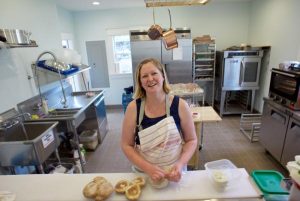 Mindy Simmons of Decadent Creations baking in her professional kitchen