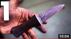 Mike is holding a finished Ski an do. Spelled S G I A N D U B H. It is a short, double edged blade of damascus steel.